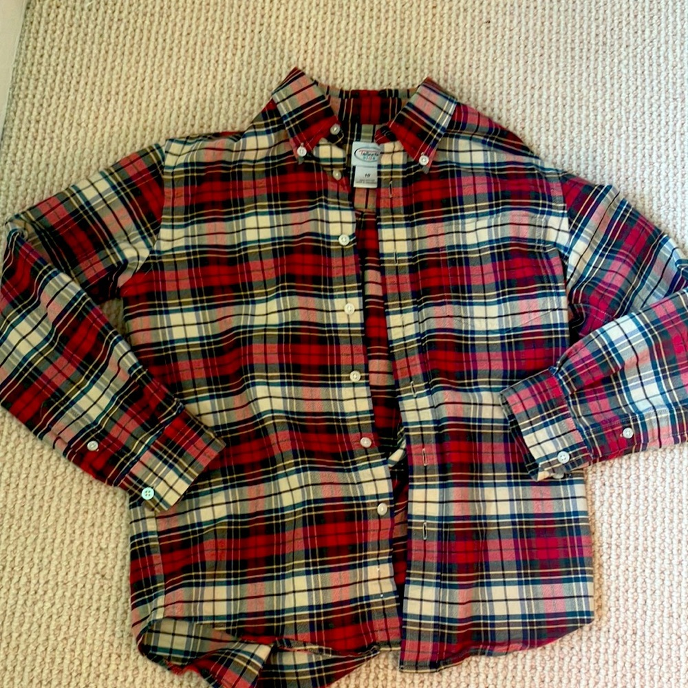 A Christmas colored, kids size ten, button down shirt.